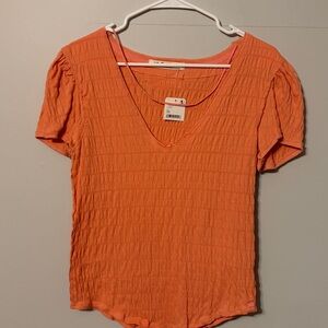 We The Free: Peach/light orange Textured V-Neck distressed/boho top. Med.NWT.
